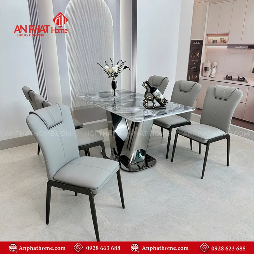Bộ bàn ghế ăn mặt đá chân inox sang trọng BA-1964 16 Với thiết kế hiện đại kèm mặt bàn có nhiều kích thước để chọn lựa , có thể ngồi từ 4 - 8 người và quý khách có thể mua thêm ghế hoặc yêu cầu kích thước mặt bàn dài ngắn tùy theo nhu cầu sử dụng