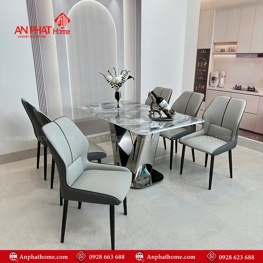 Bộ bàn ghế ăn mặt đá chân inox sang trọng BA-1964 17 Với thiết kế hiện đại kèm mặt bàn có nhiều kích thước để chọn lựa , có thể ngồi từ 4 - 8 người và quý khách có thể mua thêm ghế hoặc yêu cầu kích thước mặt bàn dài ngắn tùy theo nhu cầu sử dụng