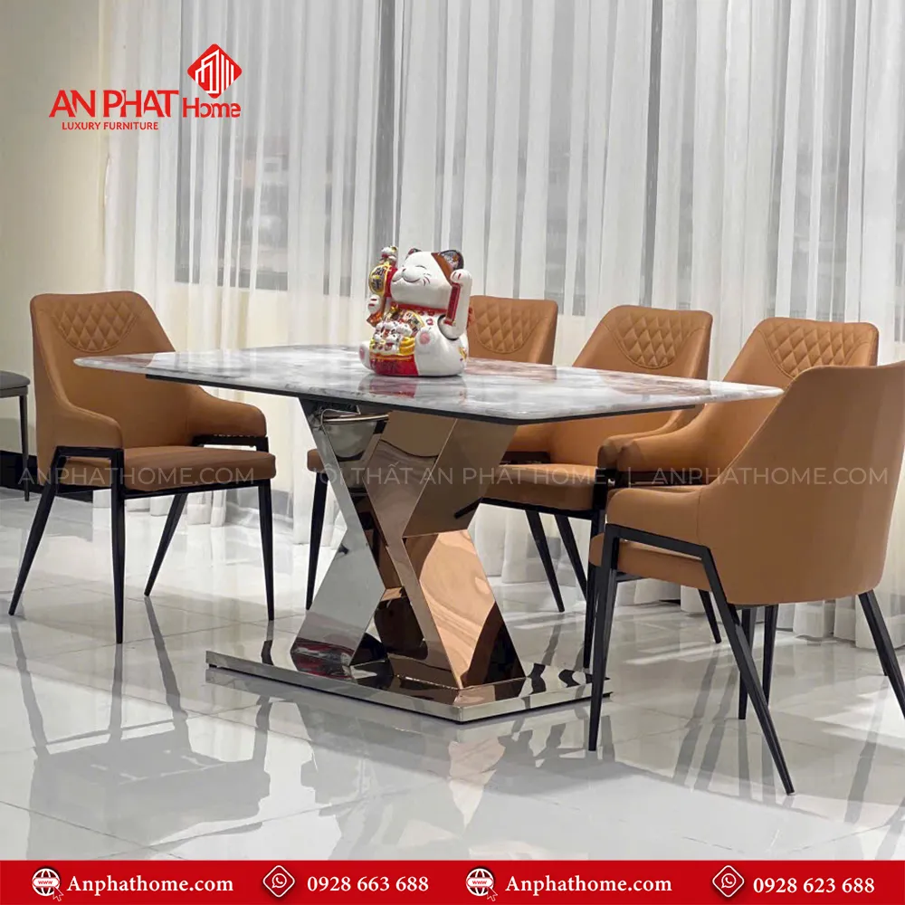 Bộ bàn ghế ăn mặt đá khung inox hiện đại BA-1949 14 Ghế ăn được bọc bằng da Microfiber, đem lại sự êm ái và dễ chịu trong suốt bữa ăn, cùng với thiết kế thanh lịch và thanh thoát, góp phần làm nổi bật không gian bếp hoặc phòng ăn của bạn