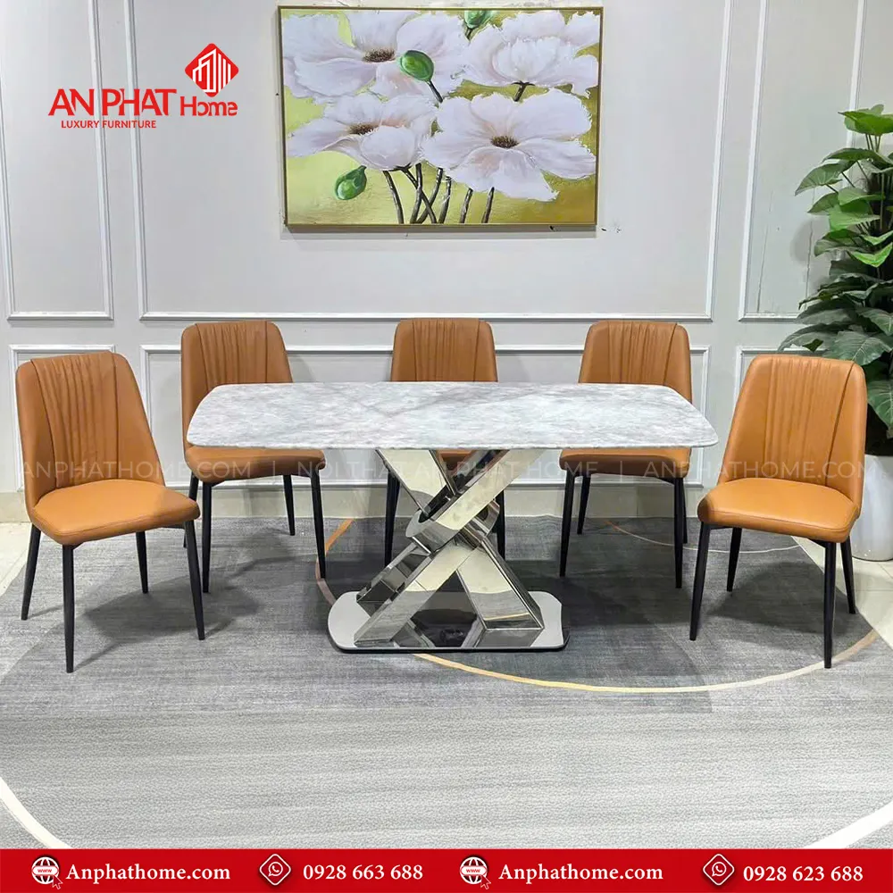 Bộ bàn ghế ăn mặt đá thạch anh chân inox BA-1998 12 Chân bàn thiết kế vô cùng sang trọng, mặt bàn đá thạch anh với nhiều kích thước đa dạng từ 1m40 – 2m20 quý khách có thể lựa chọn mua thêm số lượng ghế, tùy theo nhu cầu sử dụng.
