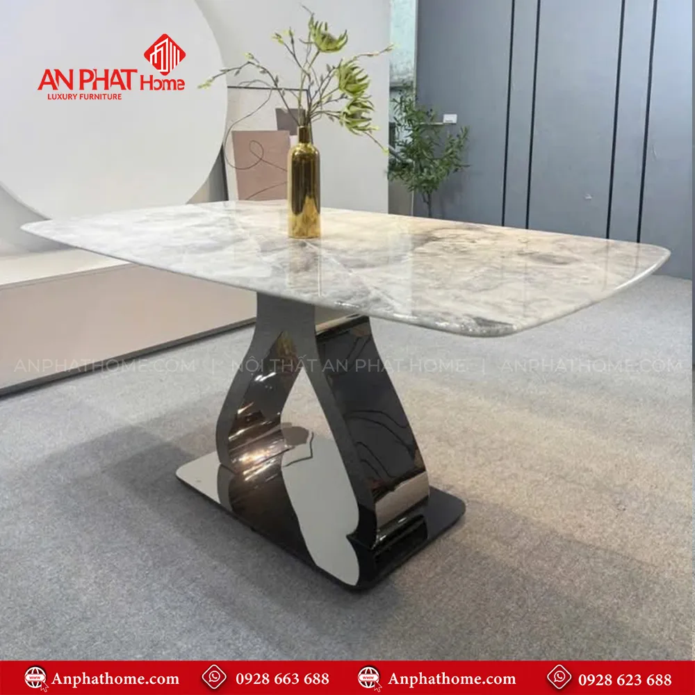 Bộ bàn mặt đá 6 ghế nhập khẩu BA-1956 13 Chân bàn thiết kế hiện đại có đường cong uốn lượn tạo cảm giác sang trọng, và hơn nữa mạ titan xám khói giúp tạo cảm giác chắc khỏe cho chân bàn